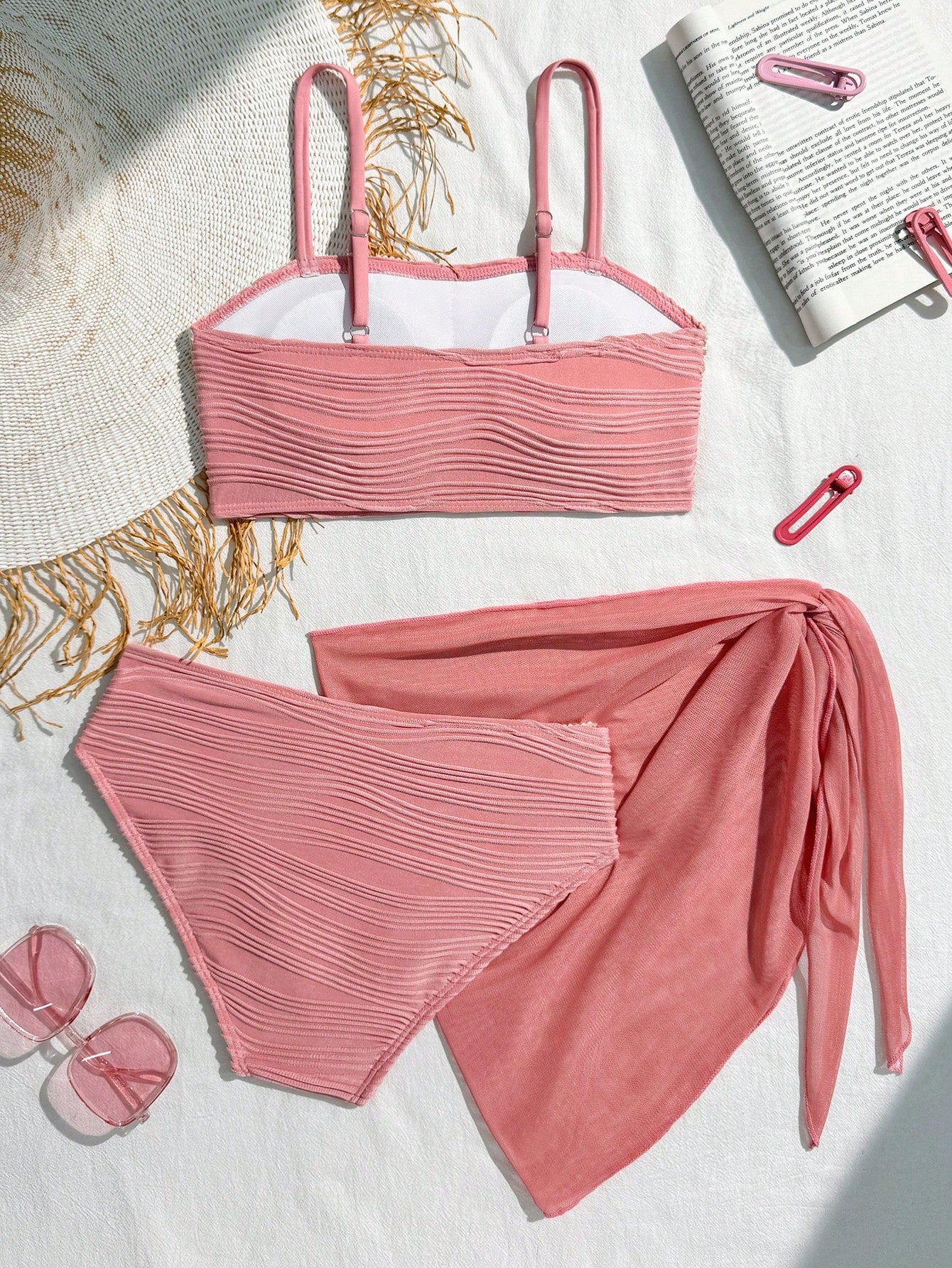 Tween girls bikini set with shell and starfish woven band details, spaghetti strap sleeveless top, and mid-waist skirt-style bottom in blue.