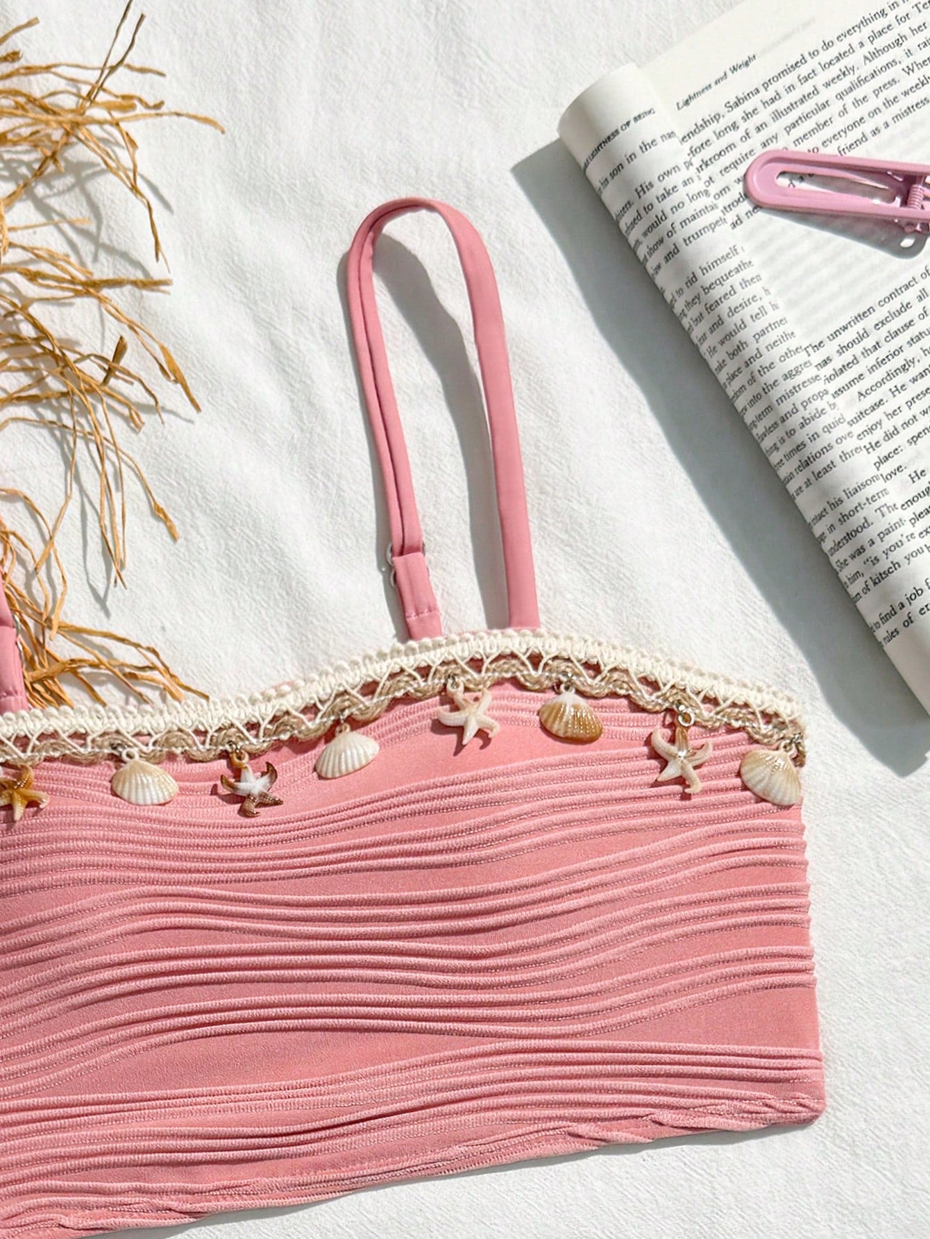 Tween girls bikini set with shell and starfish woven band details, spaghetti strap sleeveless top, and mid-waist skirt-style bottom in blue.