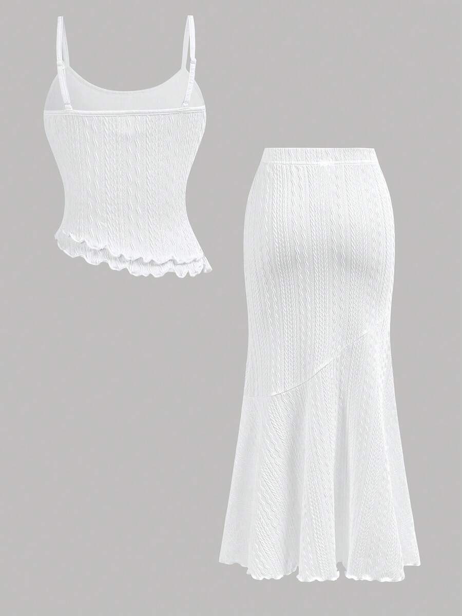 Tween girls blue 2-piece set featuring a short spaghetti strap lace tank top with asymmetrical lettuce trim and a long matching skirt.