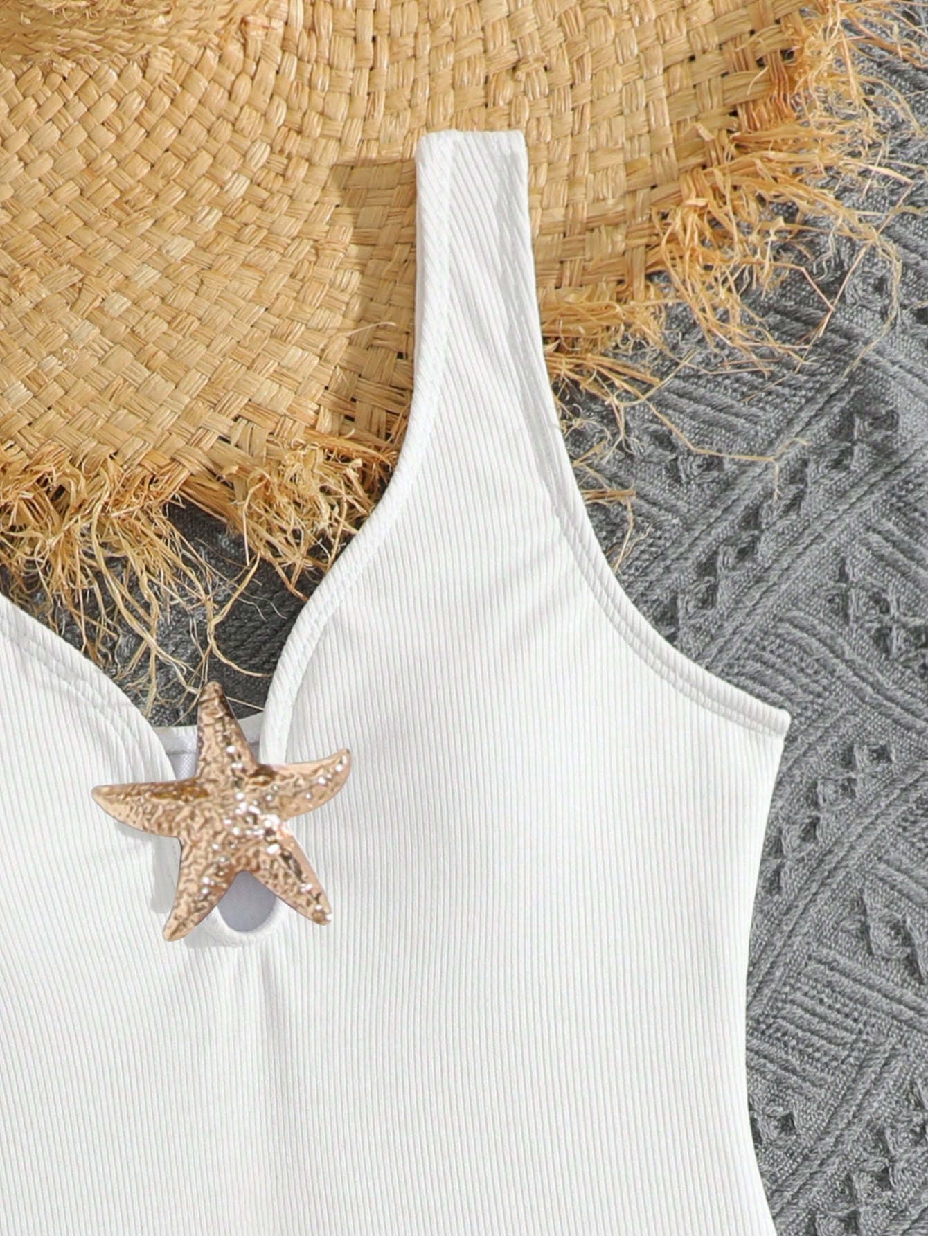 Purple rib knit one-piece swimsuit for tween girls with spaghetti straps, fitted shape, mid-waist bottom, wireless bra, and lined body.