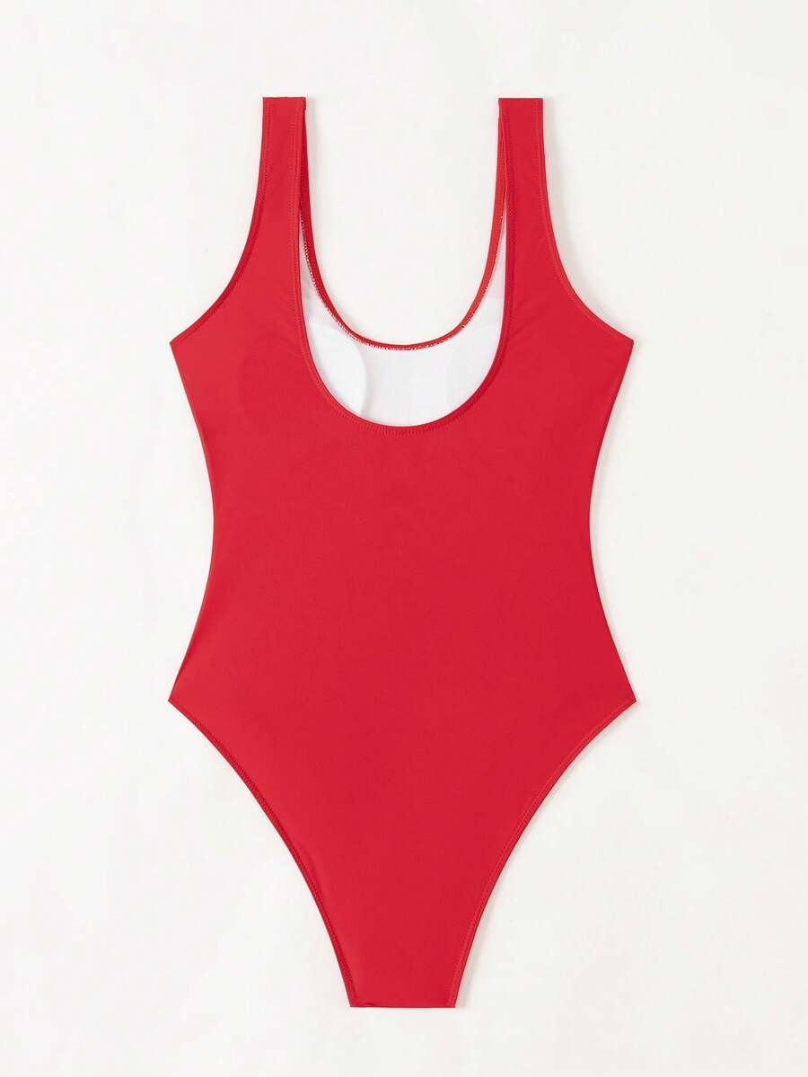 Women's solid color one-piece swimsuit featuring a backless scoop neck design and high cut fit