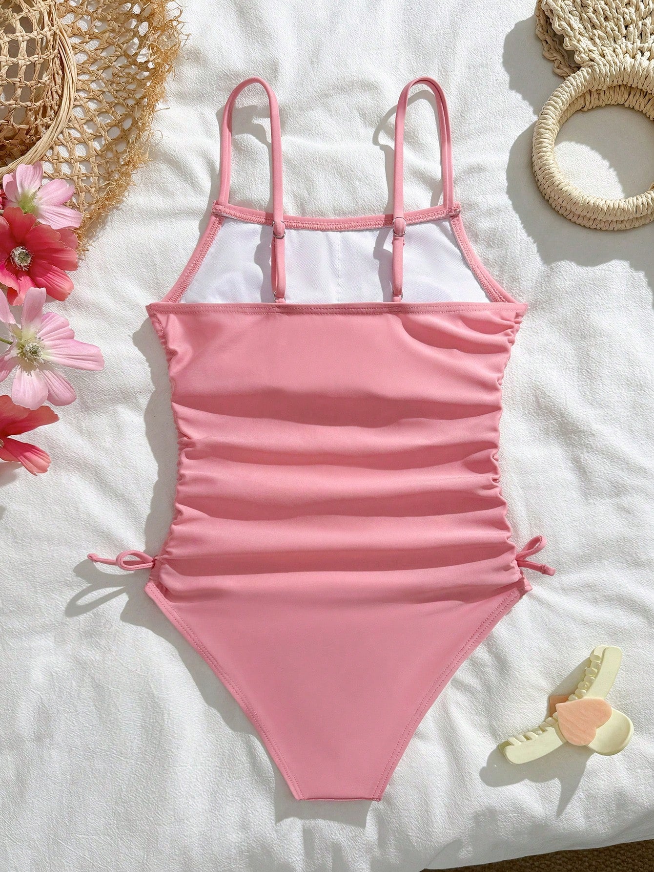 White tween girls one-piece swimsuit with V-neck, cutout detail, appliques, plant pattern, mid-waist bottom, and lined body for beach or swimming