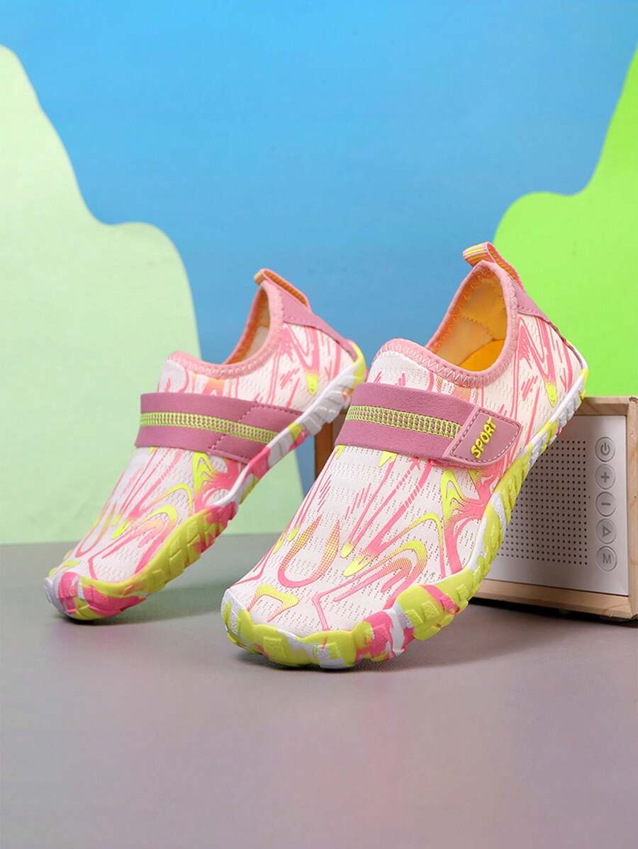 Children's water shoes featuring a breathable mesh upper, hook and loop closure, luminous details, and a non-slip outsole for boys and girls.