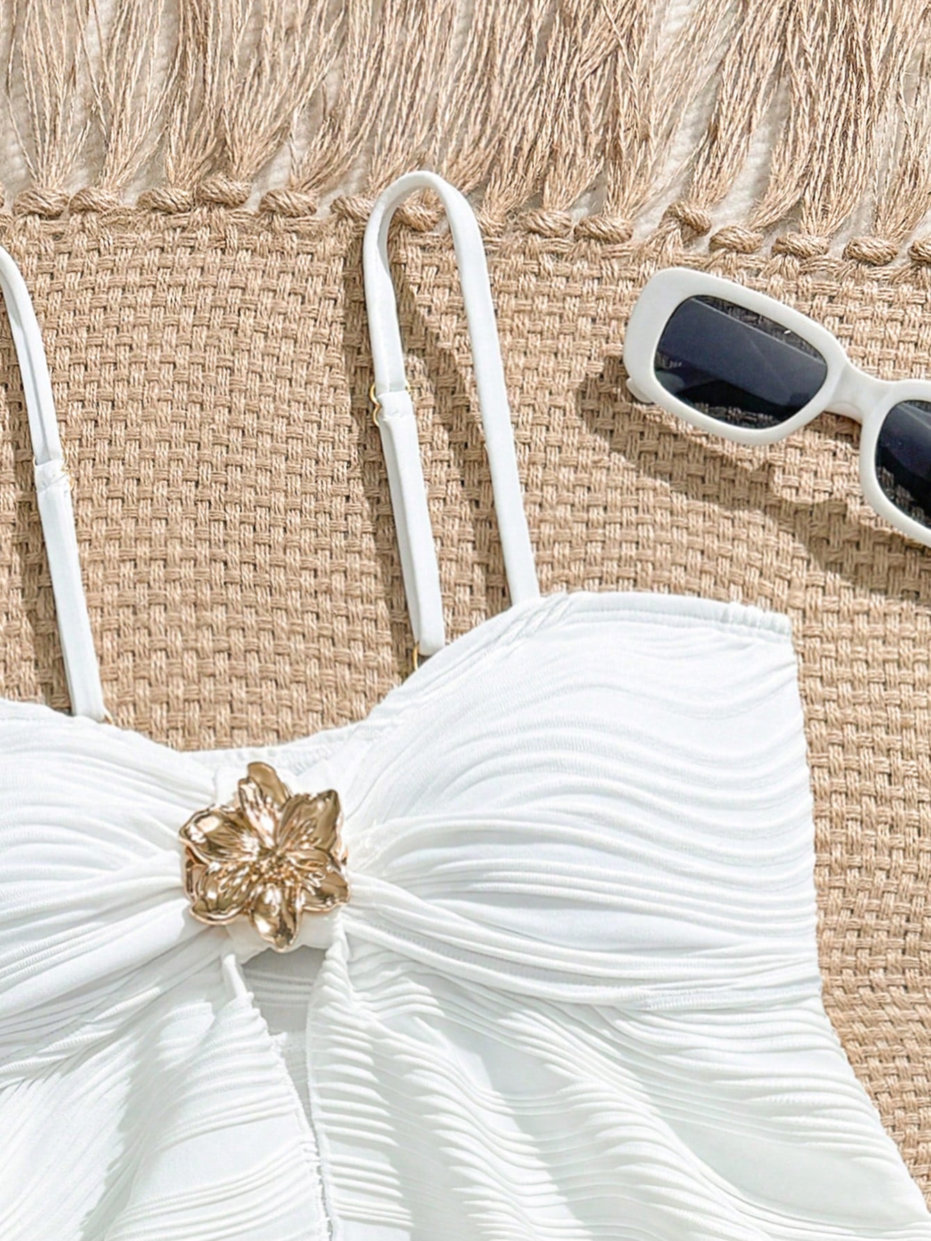 Tween girls 2-piece tankini swimwear set in apricot with a textured jacquard look, asymmetrical spaghetti-strap sleeveless top, and matching mid-waist short bikini bottoms.