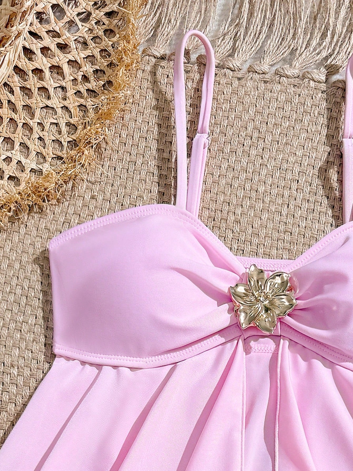 Tween girls 2-piece tankini swimwear set in apricot with a textured jacquard look, asymmetrical spaghetti-strap sleeveless top, and matching mid-waist short bikini bottoms.