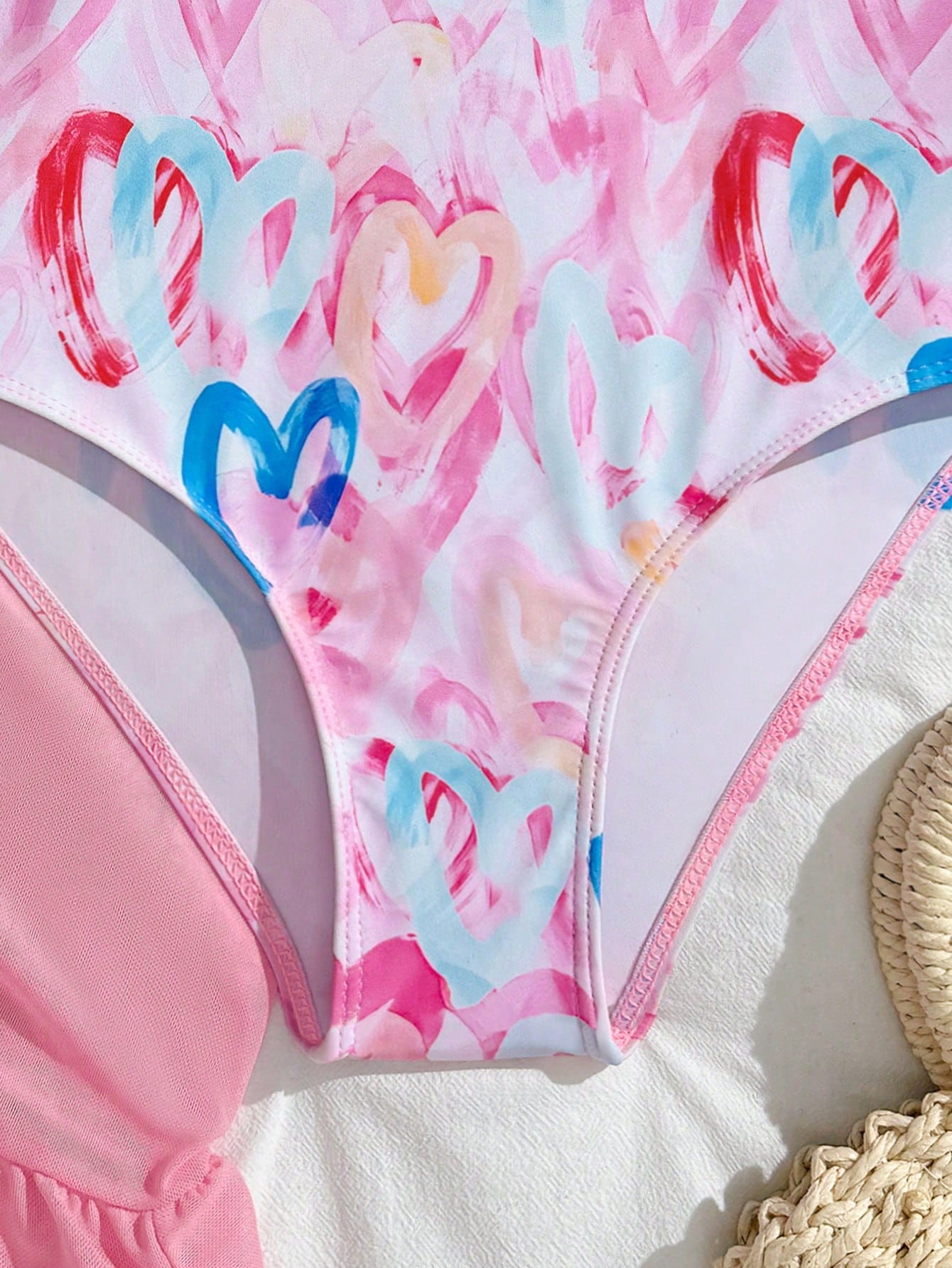 Tween girls one-piece swimsuit in leopard print with ruffle shoulder straps, scoop neckline, fitted shape, and attached ruffle hem skirt; sleeveless, mid-waist skirt bottom, and lined body for swimming, vacation, and summer beach wear.