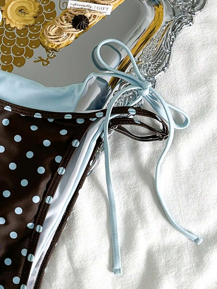 Women's retro polka dot high waist bikini swimsuit set with spaghetti straps and knot tie-back top.