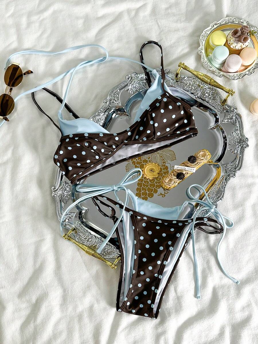 Women's retro polka dot high waist bikini swimsuit set with spaghetti straps and knot tie-back top.