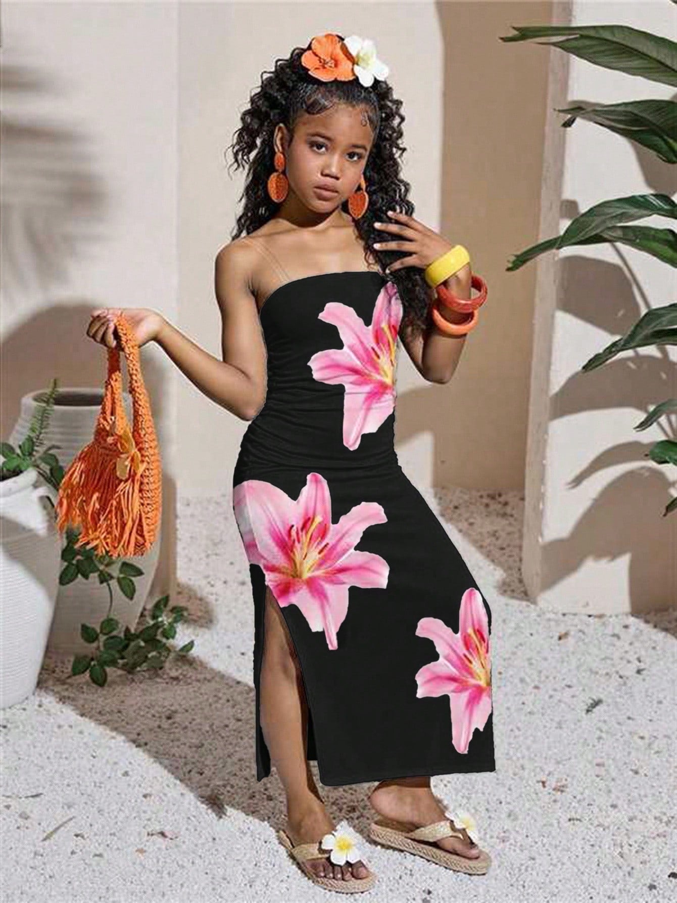 Tween girl sleeveless cami midi dress with strapless neckline, plant pattern, slim fit, natural waist, and slit hem in a multicolor vacation style.