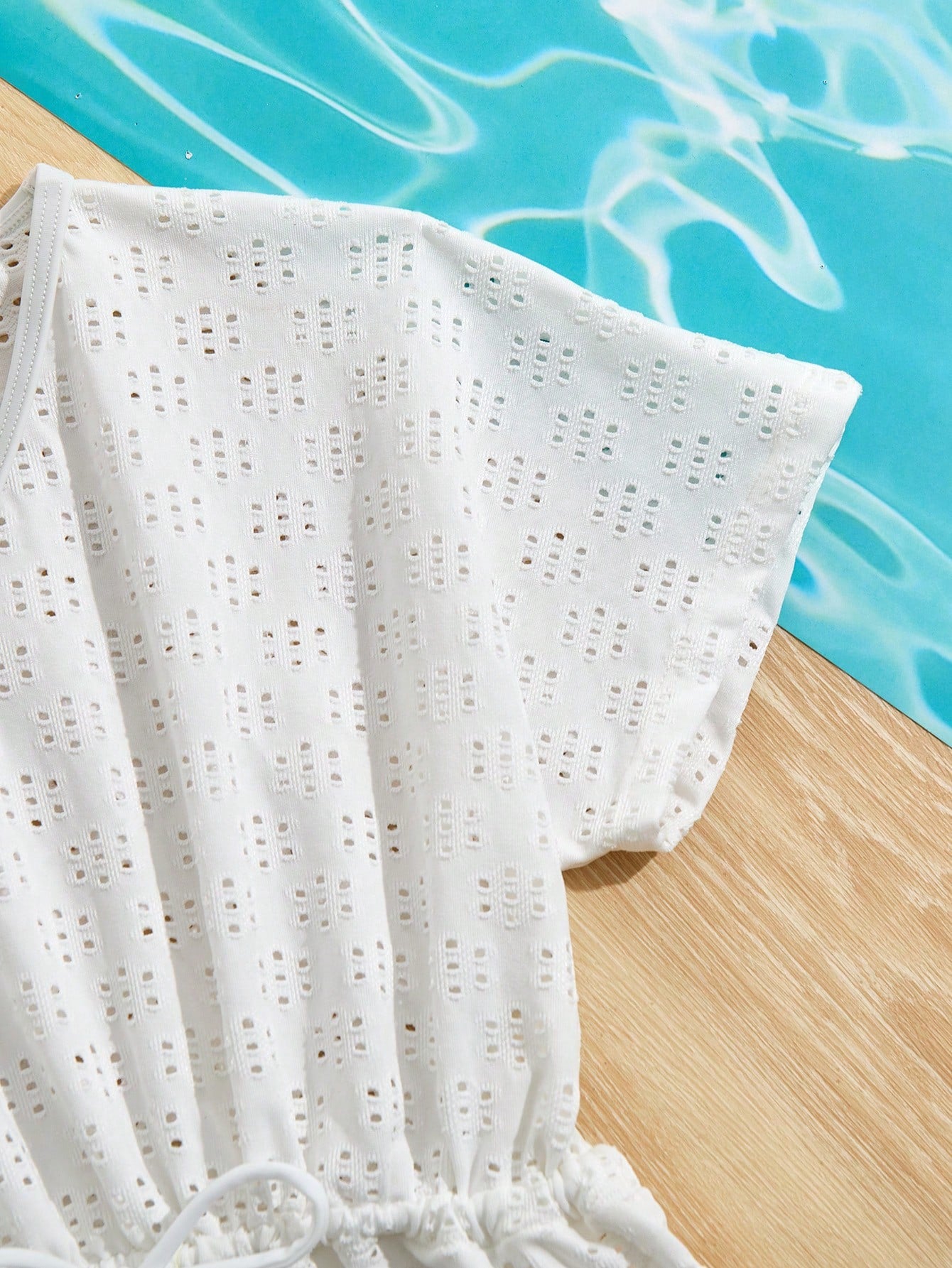 White tween girls V-neck short sleeve beach cover up with fringe decor, belted detail, zipper accent, and regular length summer holiday style