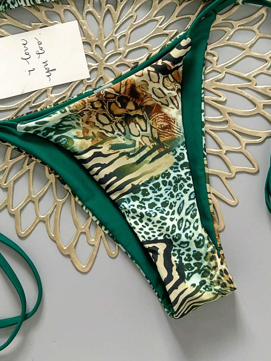 Women's vintage leopard print 2-piece bikini set featuring a high waist tie-side bottom and a halter neck triangle top.