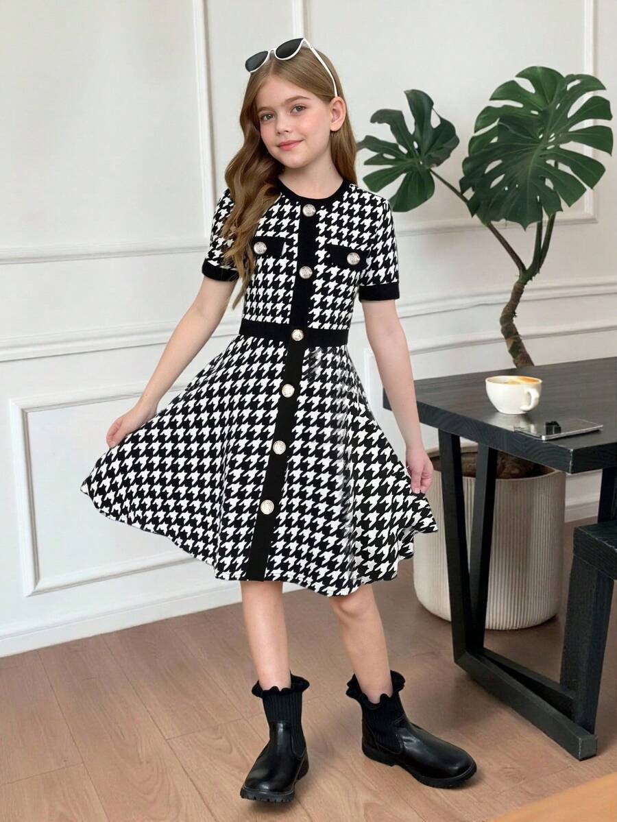 Nova Glow tween girls black and white houndstooth print short sleeve A-line dress with decorative buttons and crew neckline.