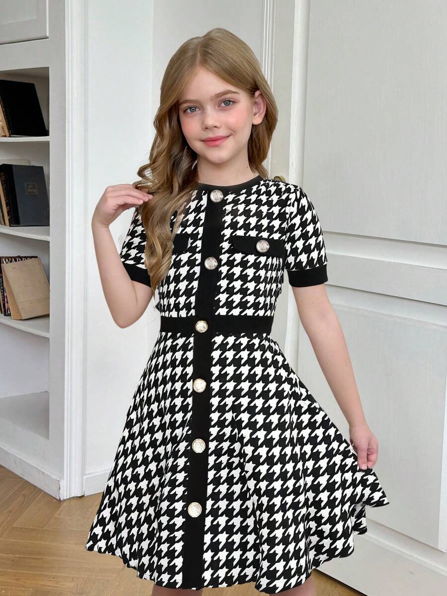 Nova Glow tween girls black and white houndstooth print short sleeve A-line dress with decorative buttons and crew neckline.