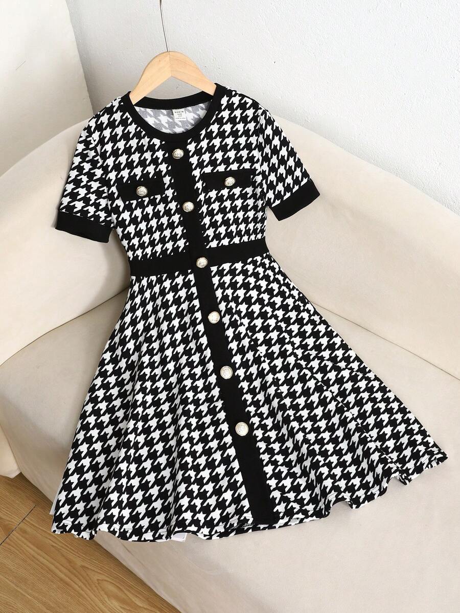 Nova Glow tween girls black and white houndstooth print short sleeve A-line dress with decorative buttons and crew neckline.