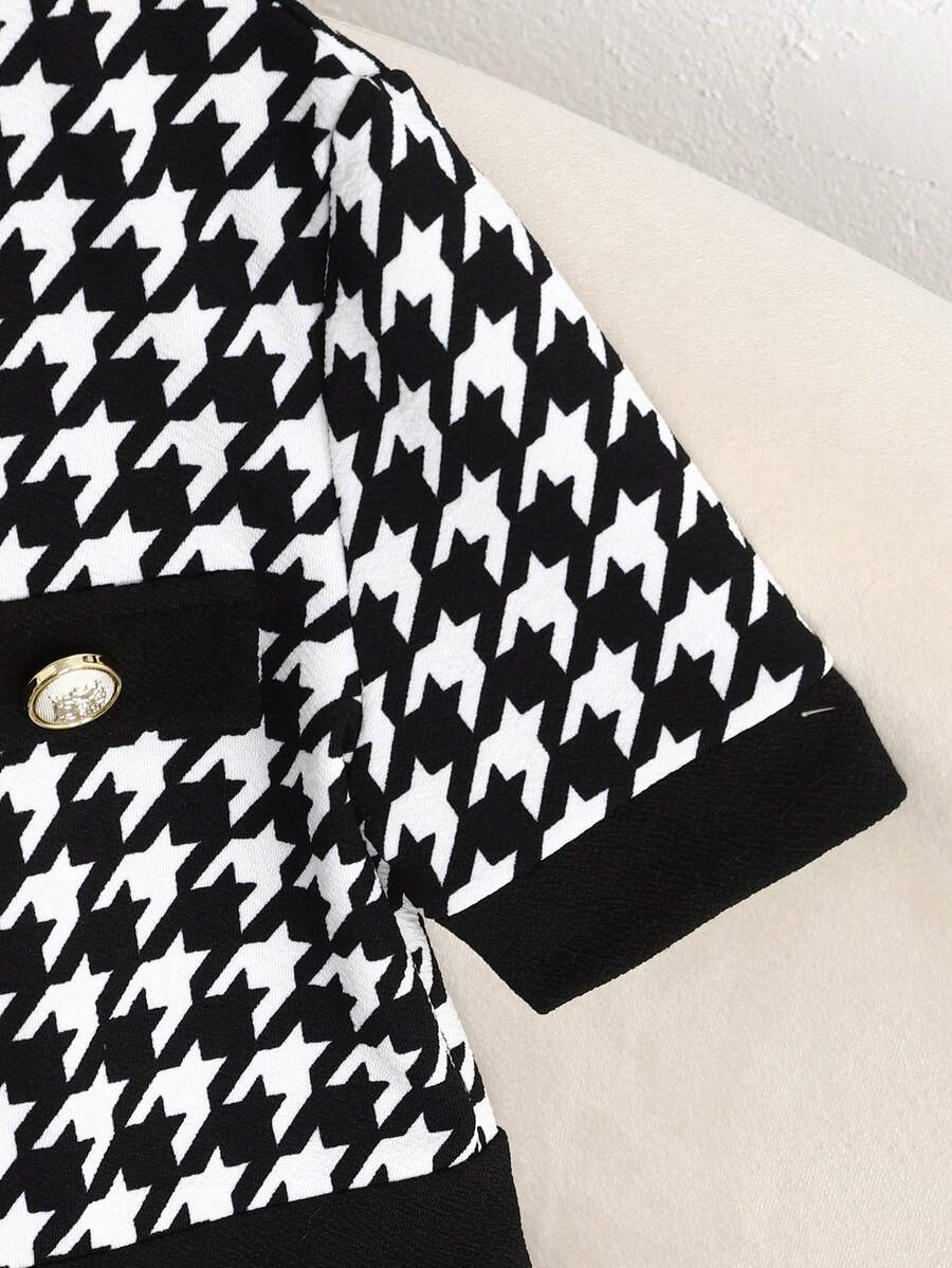 Nova Glow tween girls black and white houndstooth print short sleeve A-line dress with decorative buttons and crew neckline.