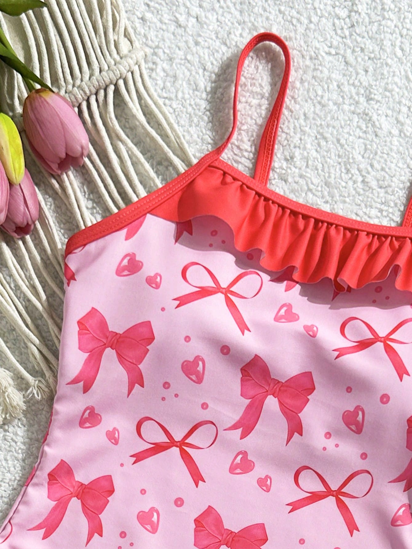Tween girl plaid all-over print one-piece swimsuit with ruffle detail, spaghetti straps, fitted shape, and multicolor patchwork style for beach or pool wear.
