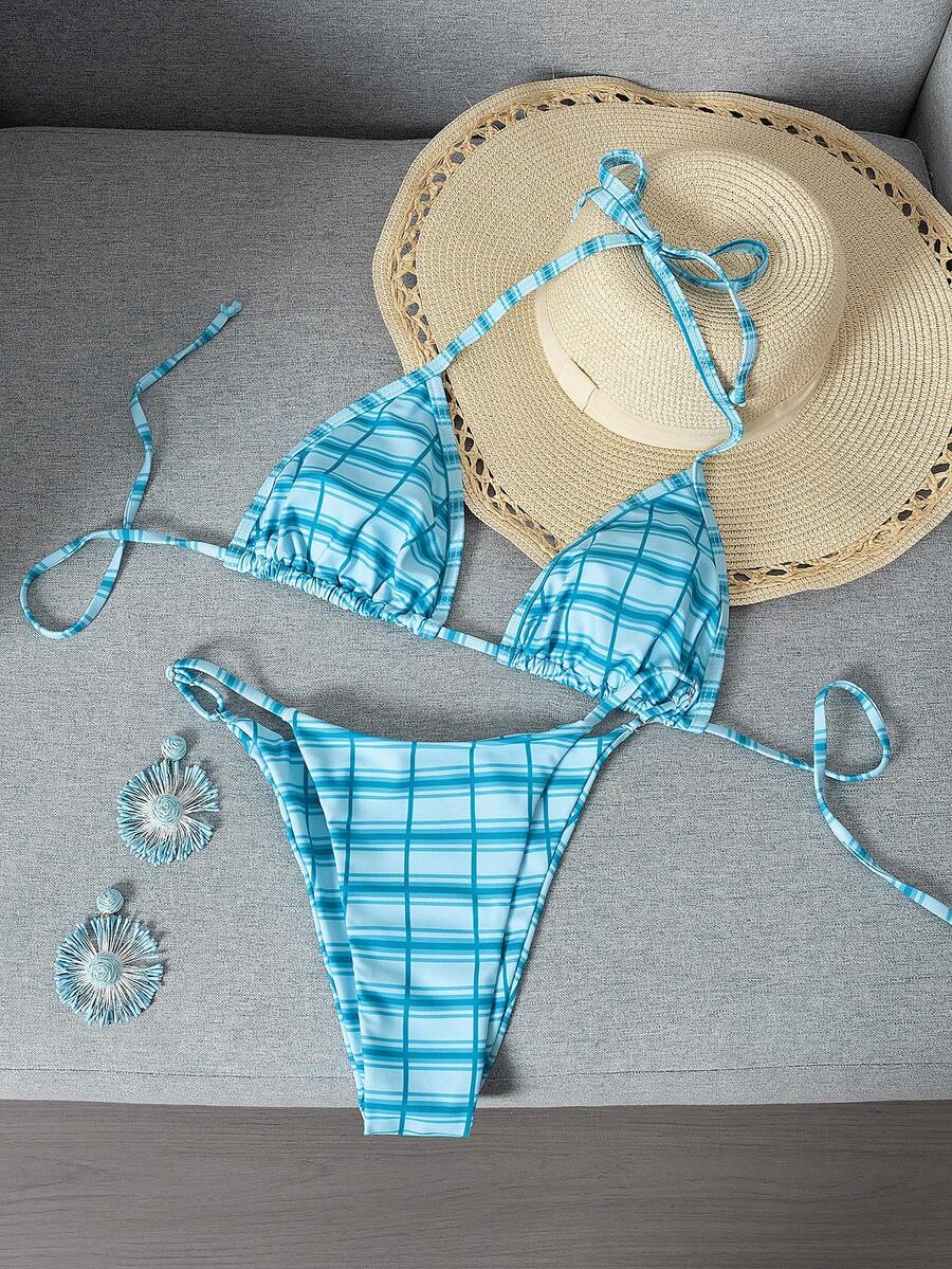 Multicolor bohemian bikini set for women featuring a backless halter top with knot details and high cut swimsuit bottoms.