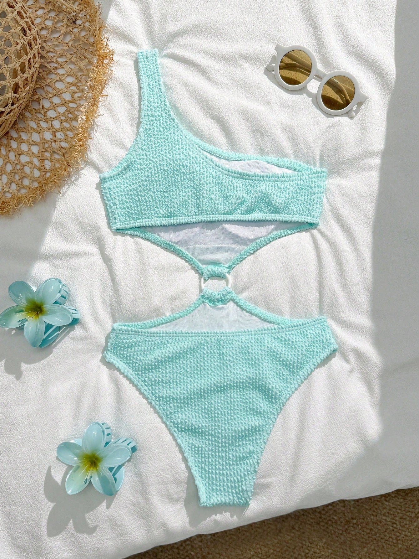 Mint blue tween girls one-piece swimsuit with asymmetrical neckline, cut-out detail, lined body, and high-stretch polyester blend fabric for vacation beachwear