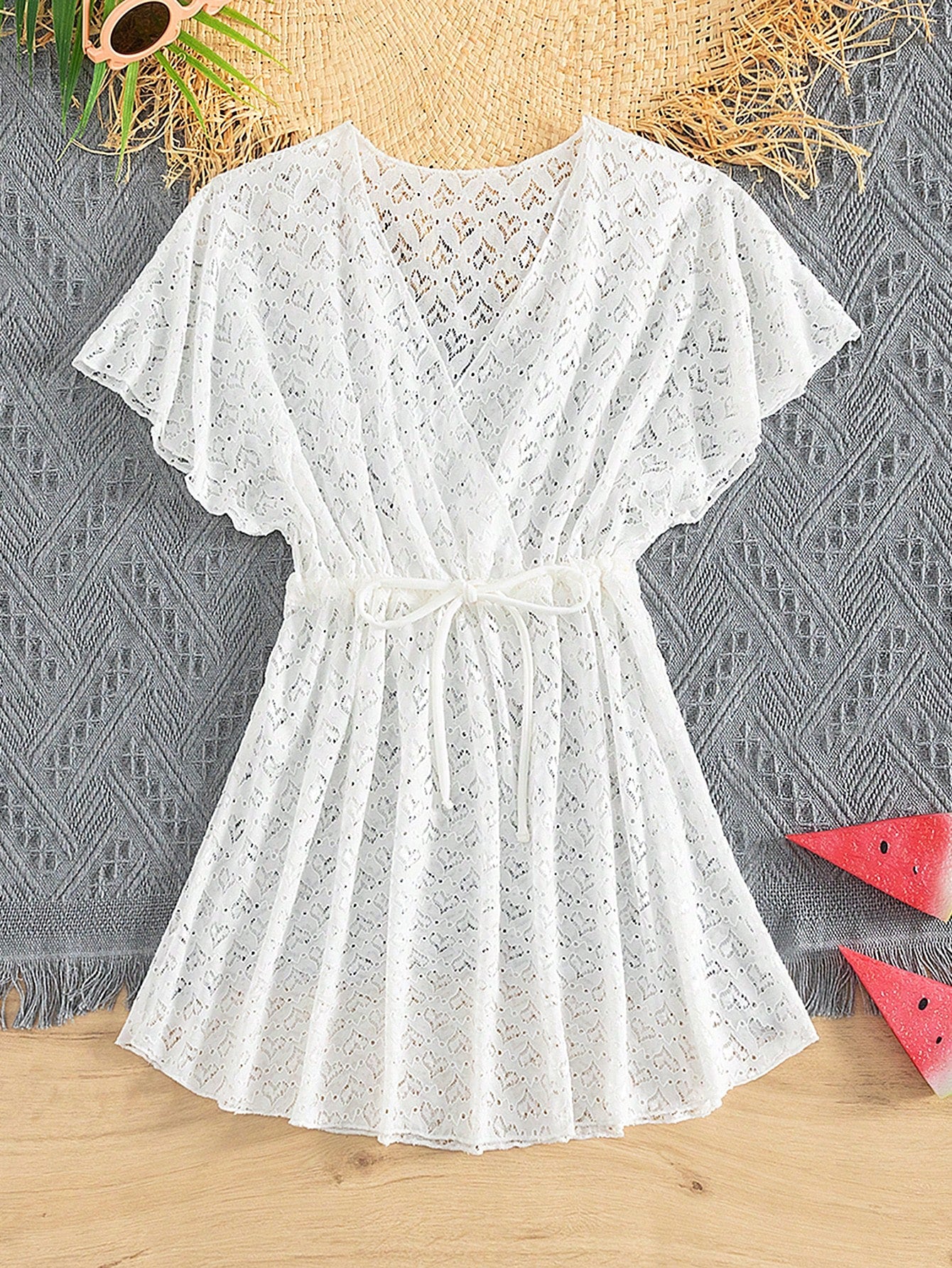 Tween girls white lace beach cover up with V neck, short sleeves, semi-sheer hollow out design, long length, and drawstring waist for summer holidays.