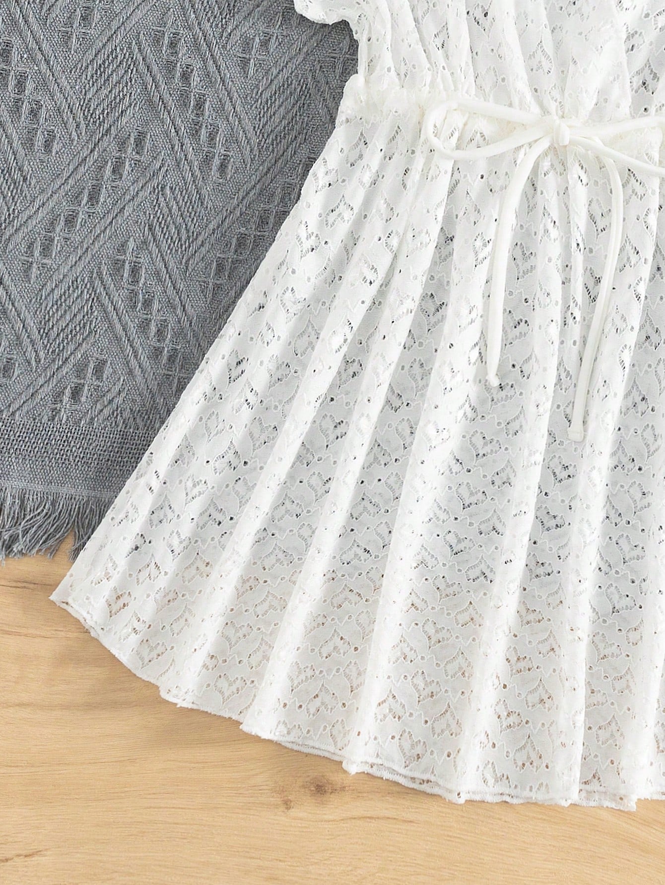 Tween girls white lace beach cover up with V neck, short sleeves, semi-sheer hollow out design, long length, and drawstring waist for summer holidays.