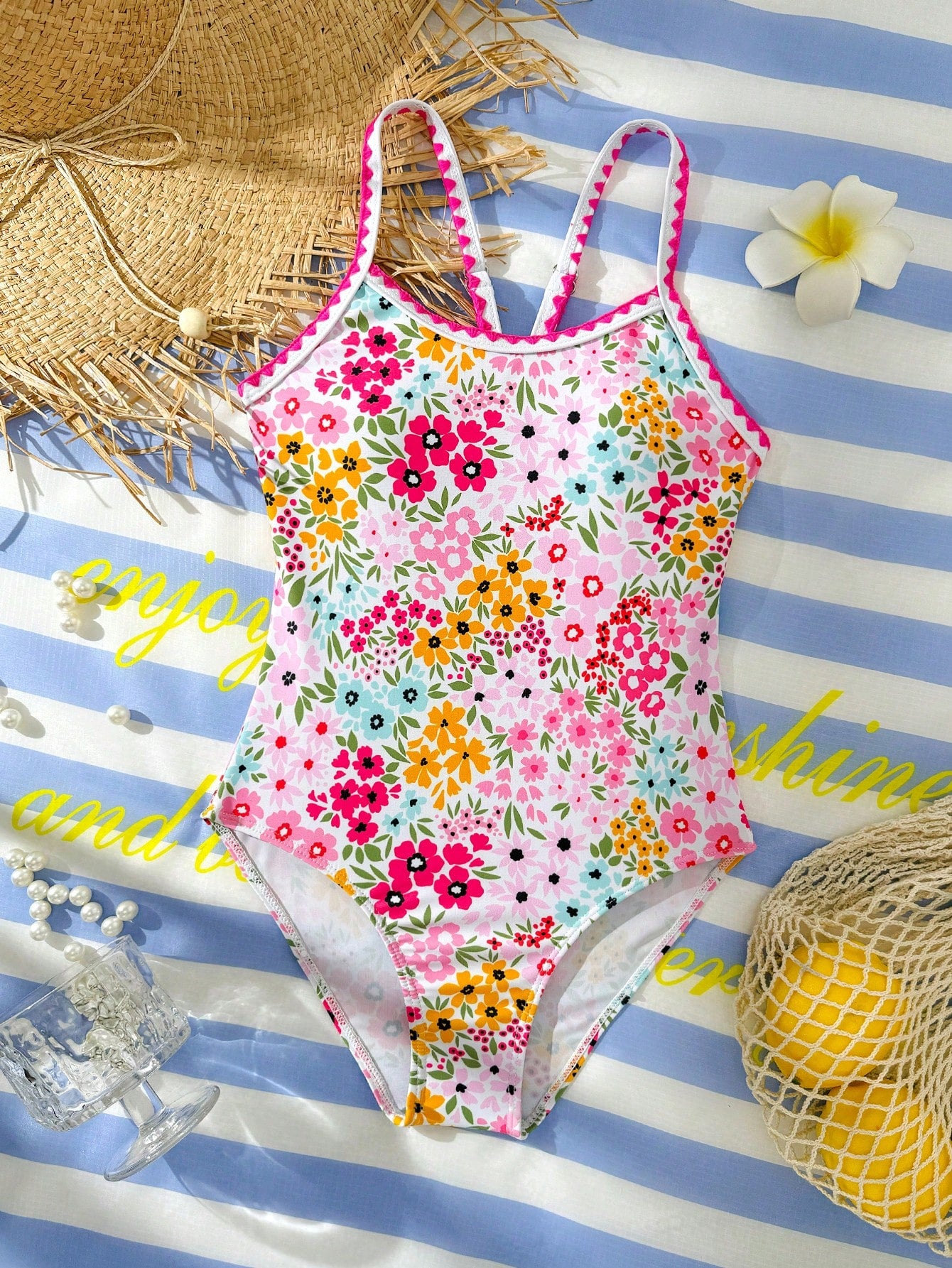 Tween girl one-piece swimsuit with floral plant print, asymmetrical neckline, cut-out detail, and fitted high-stretch design for beach and pool wear
