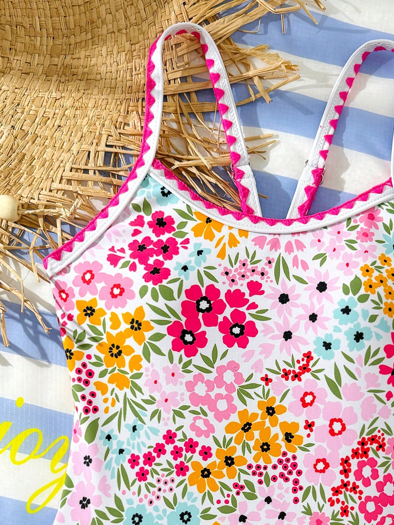 Tween girl one-piece swimsuit with floral plant print, asymmetrical neckline, cut-out detail, and fitted high-stretch design for beach and pool wear