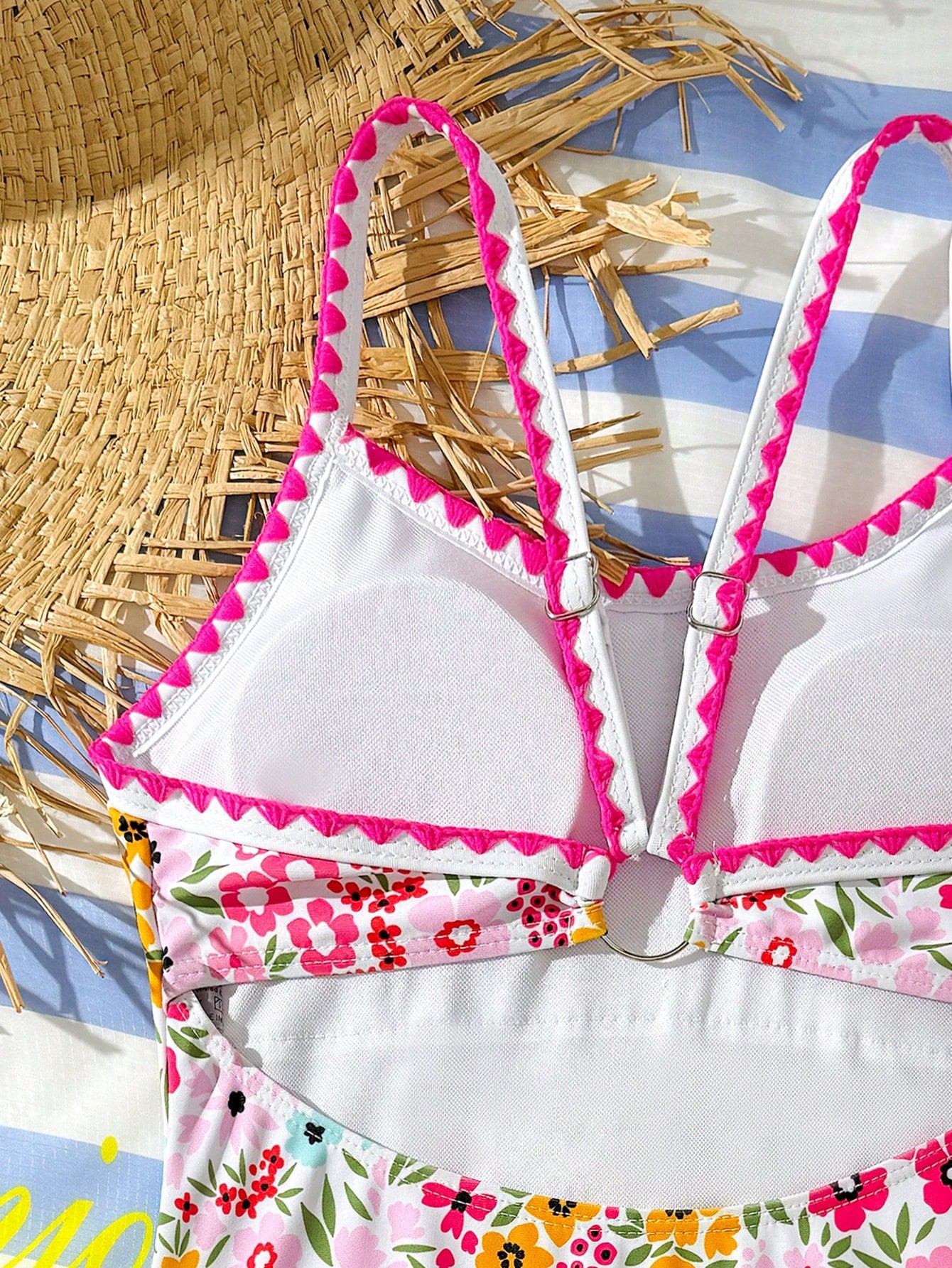 Tween girl one-piece swimsuit with floral plant print, asymmetrical neckline, cut-out detail, and fitted high-stretch design for beach and pool wear