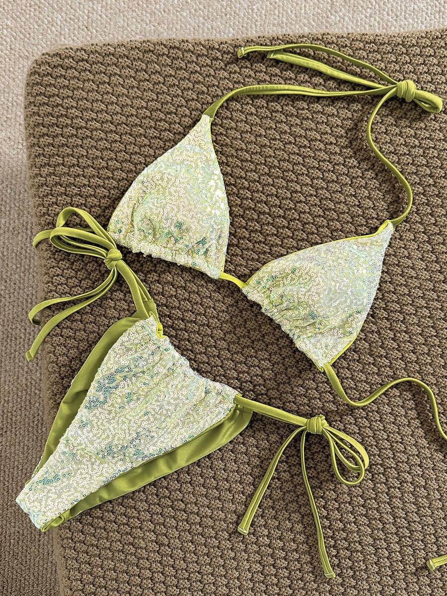 Women's apricot solid halter tie bikini top with triangle cups and matching tie-side swimsuit bottoms.