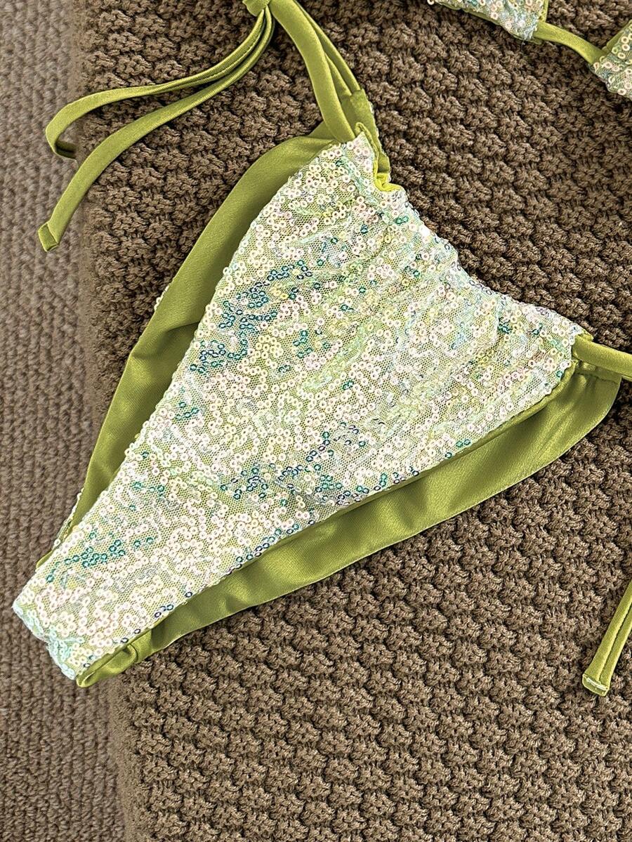 Women's apricot solid halter tie bikini top with triangle cups and matching tie-side swimsuit bottoms.