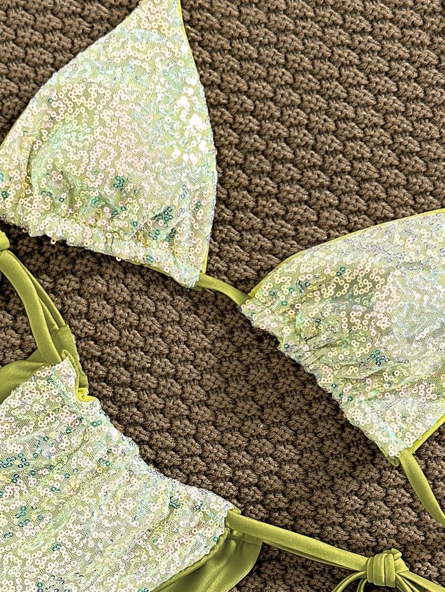 Women's apricot solid halter tie bikini top with triangle cups and matching tie-side swimsuit bottoms.