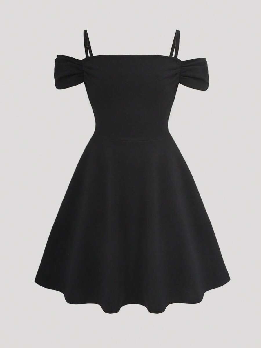 Apricot velvet A-line midi dress for tween girls featuring cold shoulder short sleeves, spaghetti straps, and a high waist.