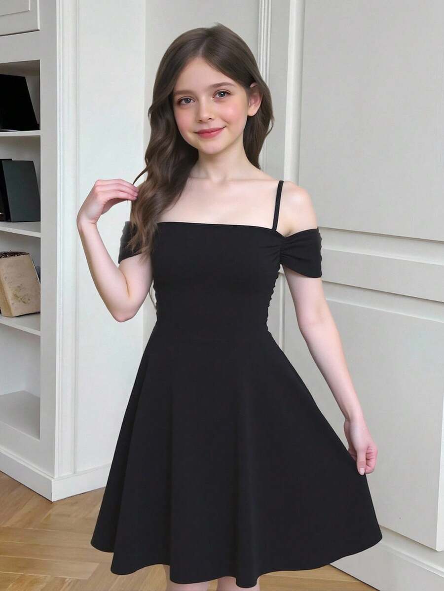 Apricot velvet A-line midi dress for tween girls featuring cold shoulder short sleeves, spaghetti straps, and a high waist.