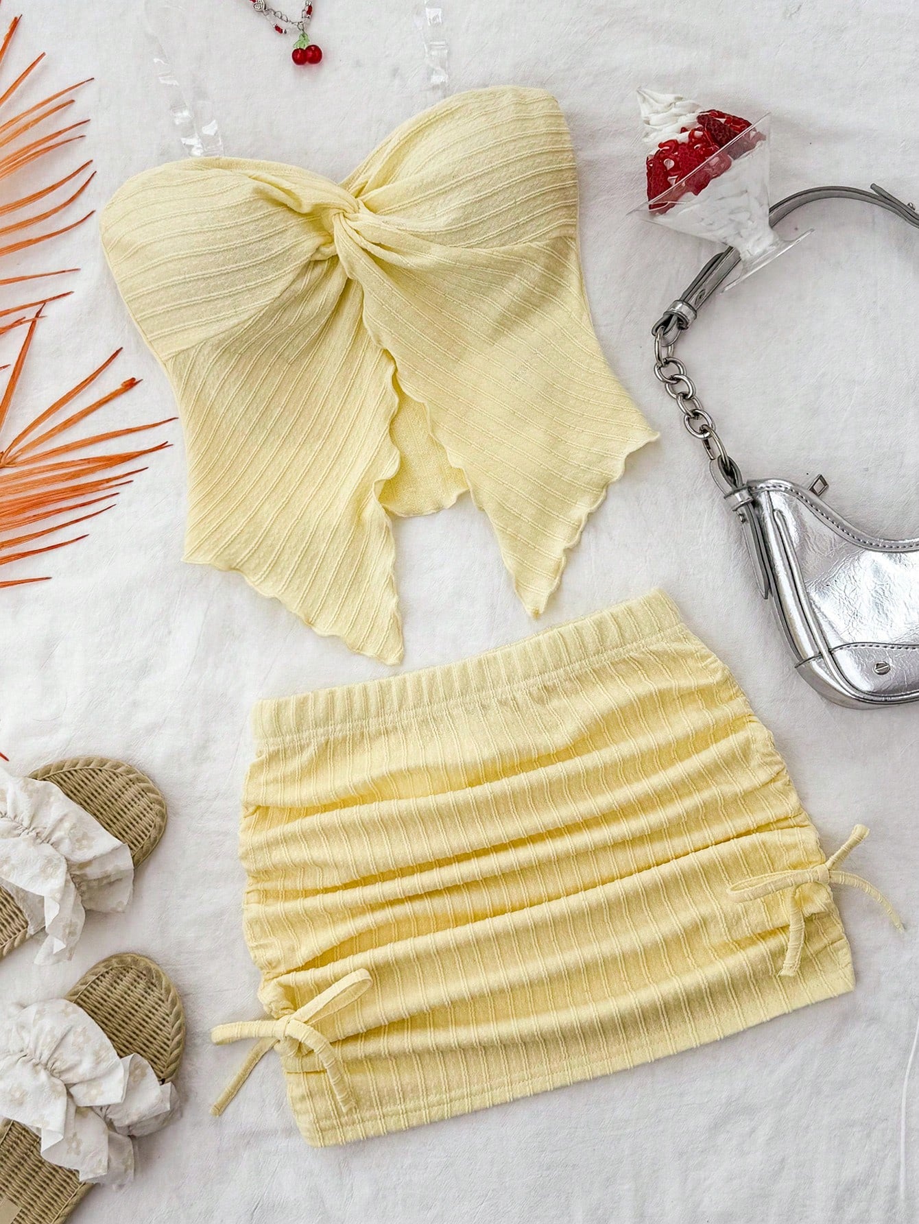 Tween girls apricot two-piece set featuring a spaghetti strap tank top and skirt with ruched lettuce trim.