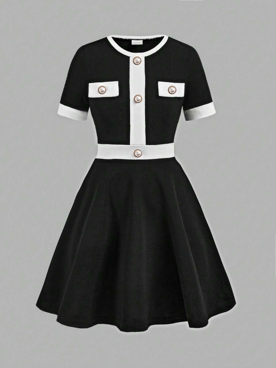 Nova Glow tween girls black and white houndstooth print short sleeve A-line dress with decorative buttons and crew neckline.