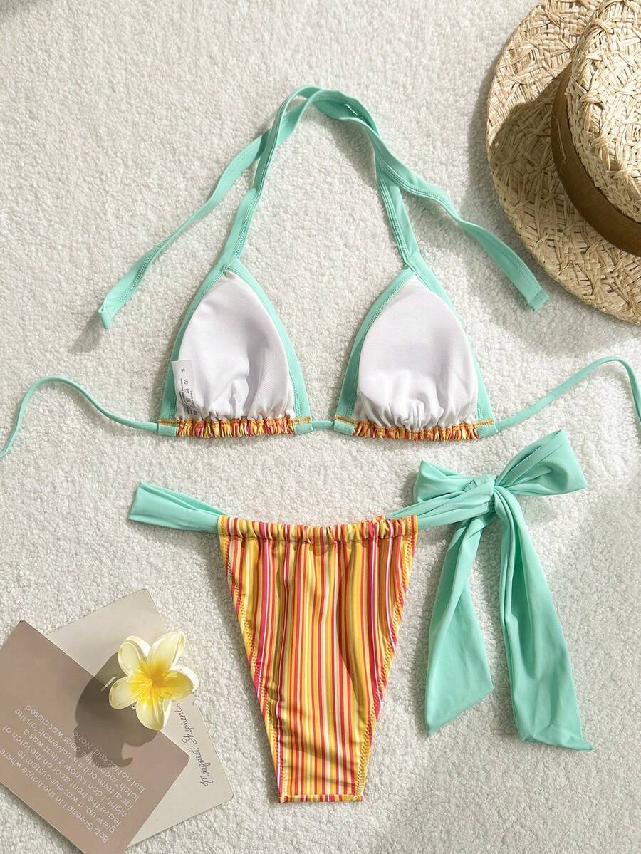 Orange striped 2-piece bikini swimsuit for women featuring a wireless spaghetti strap top with chain detail and high-waisted tie-side thong bottoms.