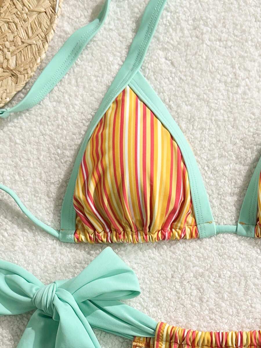 Orange striped 2-piece bikini swimsuit for women featuring a wireless spaghetti strap top with chain detail and high-waisted tie-side thong bottoms.