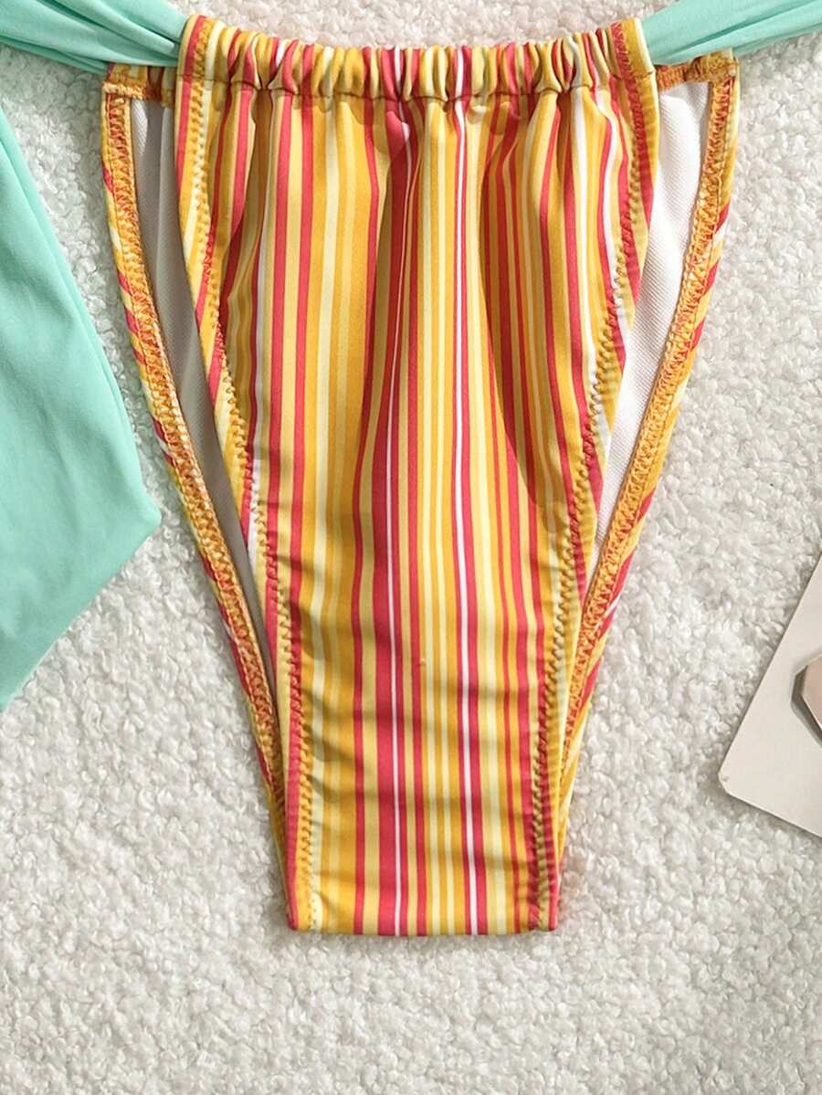 Orange striped 2-piece bikini swimsuit for women featuring a wireless spaghetti strap top with chain detail and high-waisted tie-side thong bottoms.