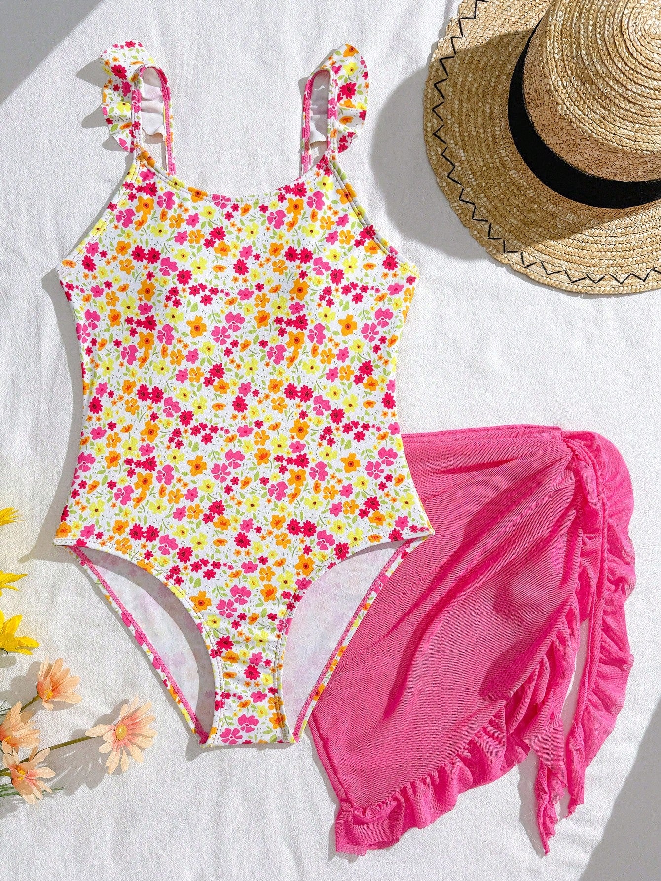 Tween girls one-piece swimsuit in leopard print with ruffle shoulder straps, scoop neckline, fitted shape, and attached ruffle hem skirt; sleeveless, mid-waist skirt bottom, and lined body for swimming, vacation, and summer beach wear.