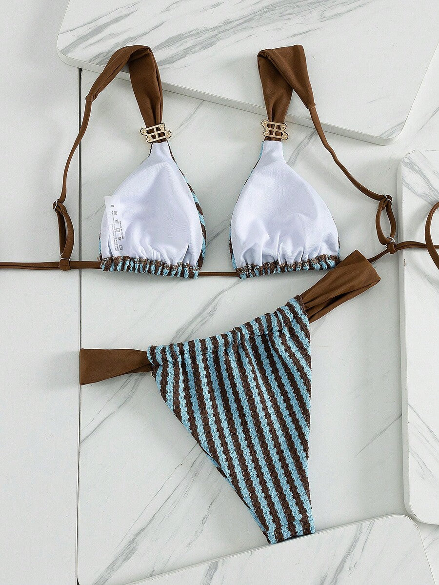 Multicolor colorblock bikini set for women featuring a wireless triangle bra top with shoulder straps and ring knot details paired with high waist high cut bottoms.