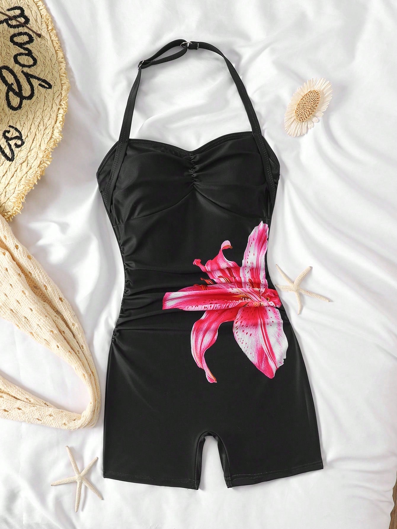 Apricot one-piece swimsuit for tween girls with a halter neckline, ruffle trim, textured knit fabric, fitted shape, and starfish metal decor.