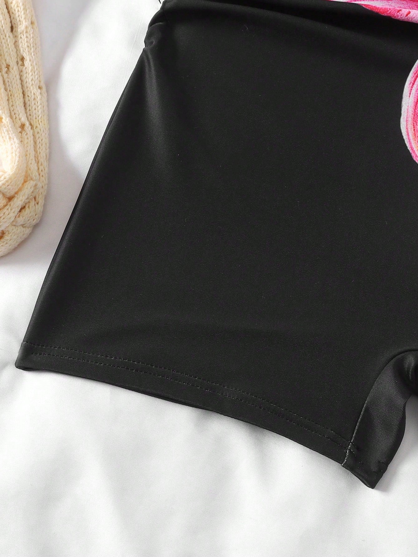 Apricot one-piece swimsuit for tween girls with a halter neckline, ruffle trim, textured knit fabric, fitted shape, and starfish metal decor.