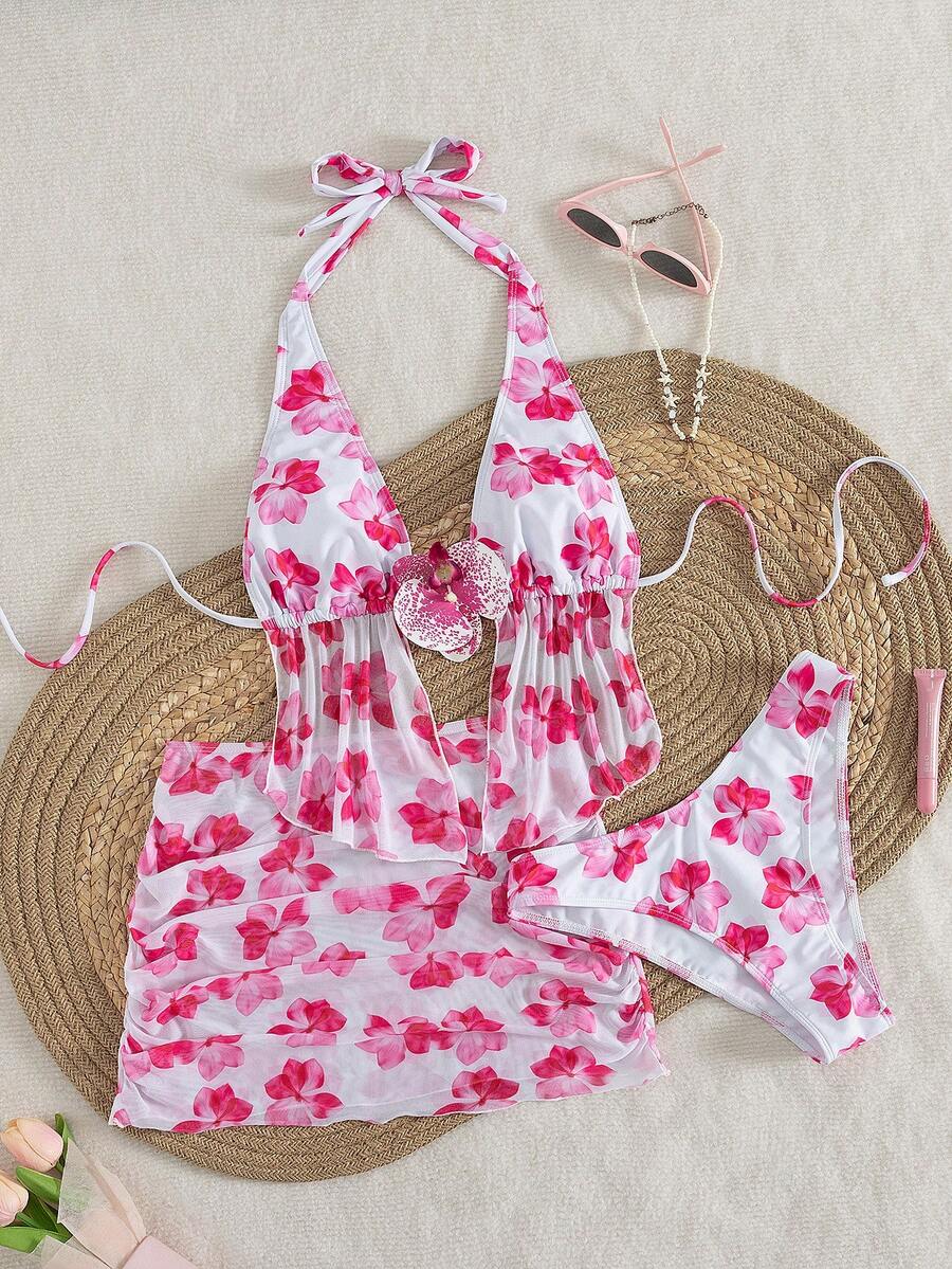 Women's 3-piece floral bikini set featuring a multicolor plant print halter top with 3D rose detail, matching bikini bottoms, and short skirt cover-up