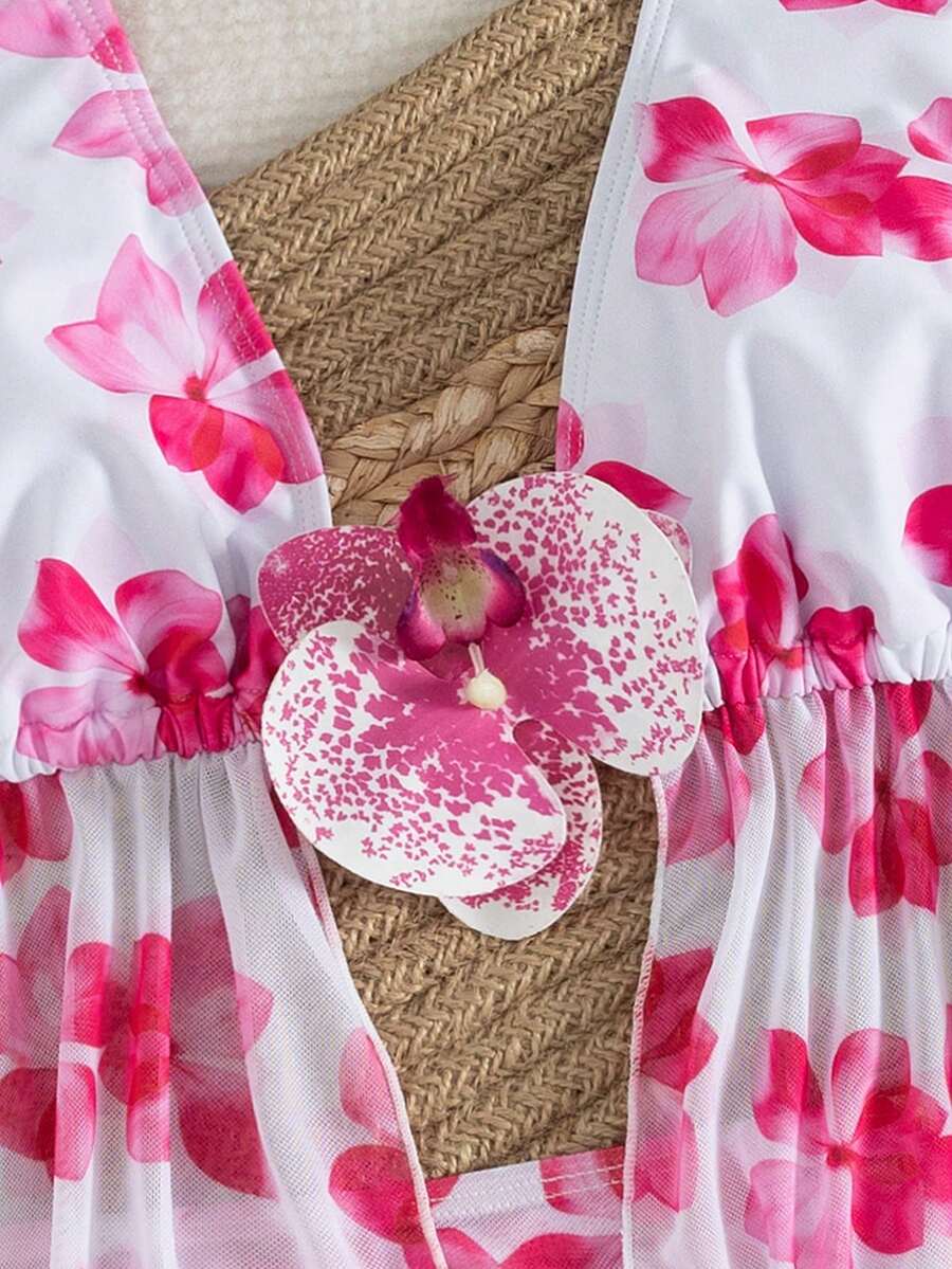 Women's 3-piece floral bikini set featuring a multicolor plant print halter top with 3D rose detail, matching bikini bottoms, and short skirt cover-up