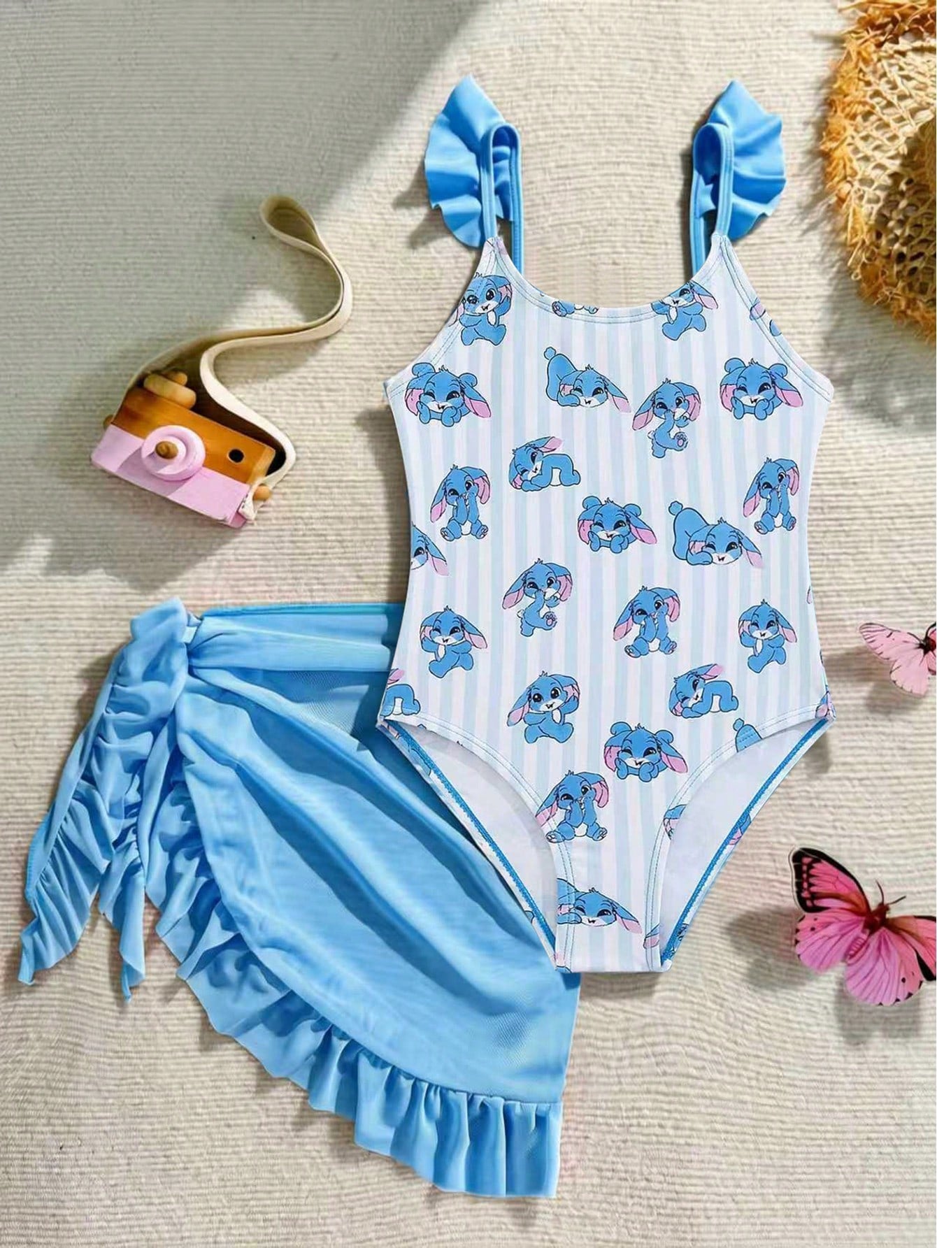 Tween girls one-piece swimsuit in leopard print with ruffle shoulder straps, scoop neckline, fitted shape, and attached ruffle hem skirt; sleeveless, mid-waist skirt bottom, and lined body for swimming, vacation, and summer beach wear.
