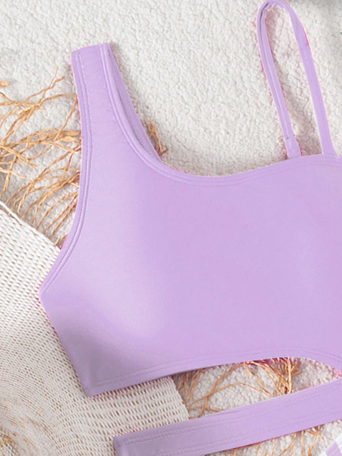 Purple tween girls one-piece swimsuit with asymmetrical neckline, cut-out waist, striped pattern, fitted silhouette, and lined body.