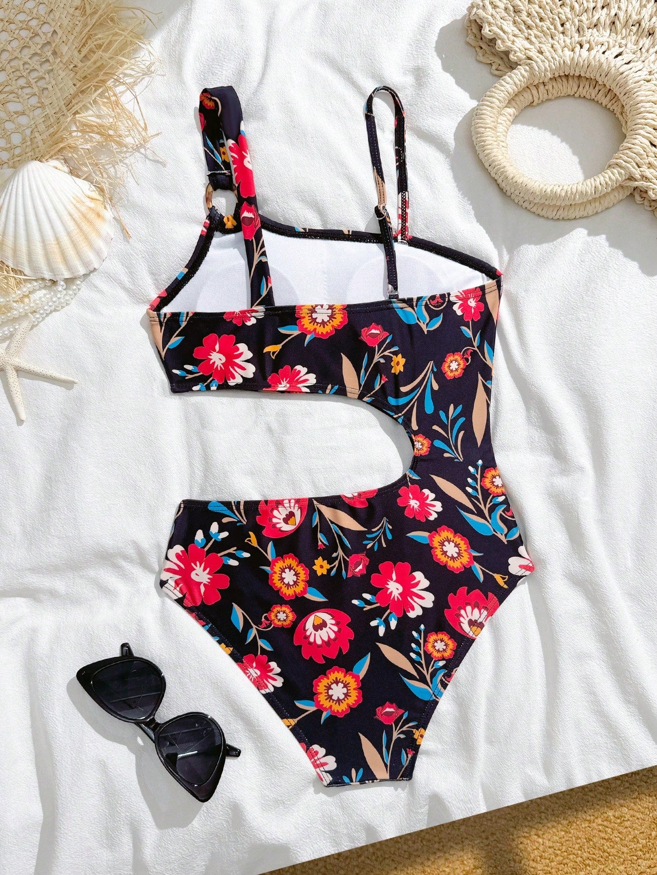 Tween girl plaid all-over print one-piece swimsuit with ruffle detail, spaghetti straps, fitted shape, and multicolor patchwork style for beach or pool wear.