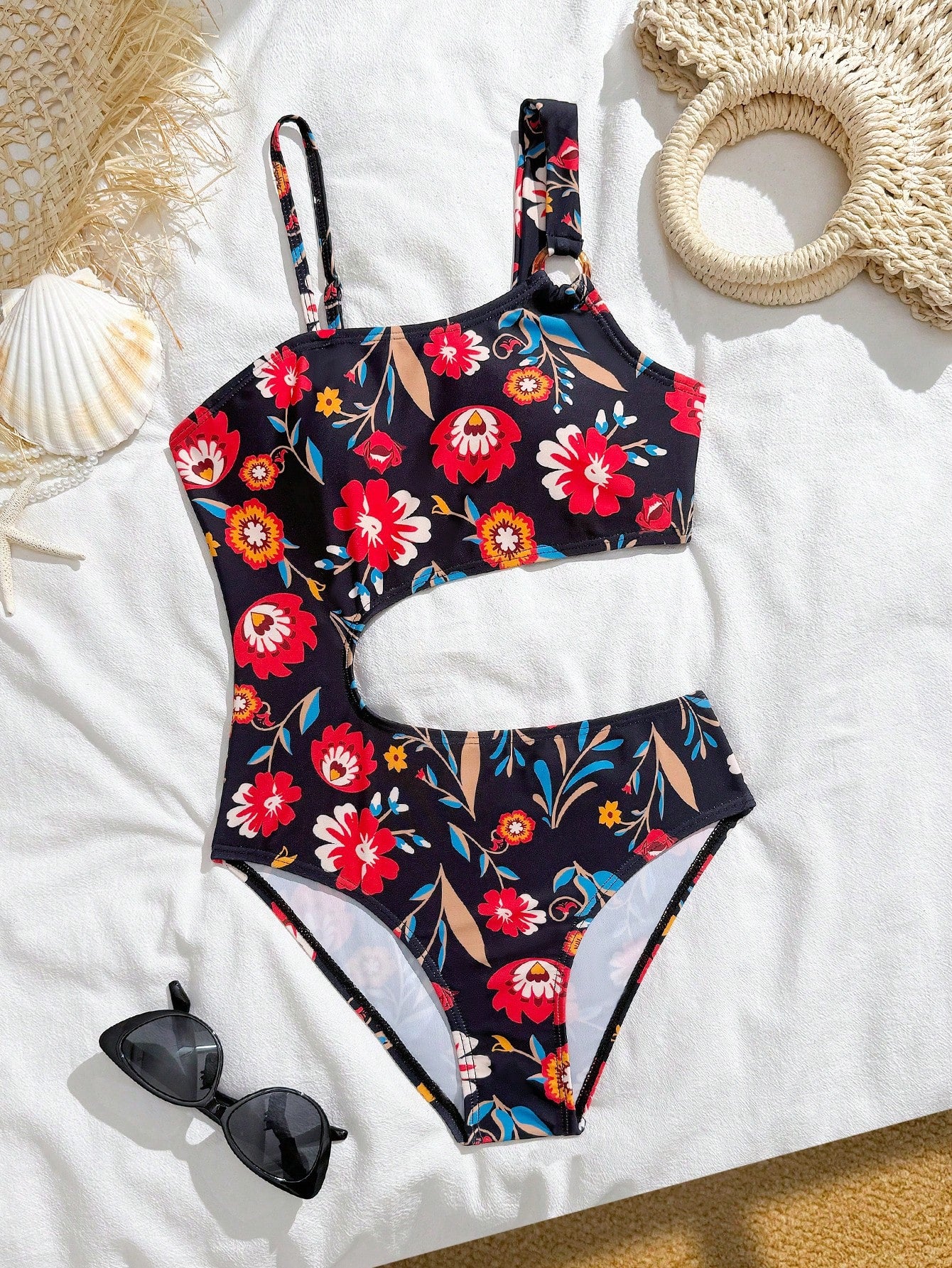 Tween girl plaid all-over print one-piece swimsuit with ruffle detail, spaghetti straps, fitted shape, and multicolor patchwork style for beach or pool wear.