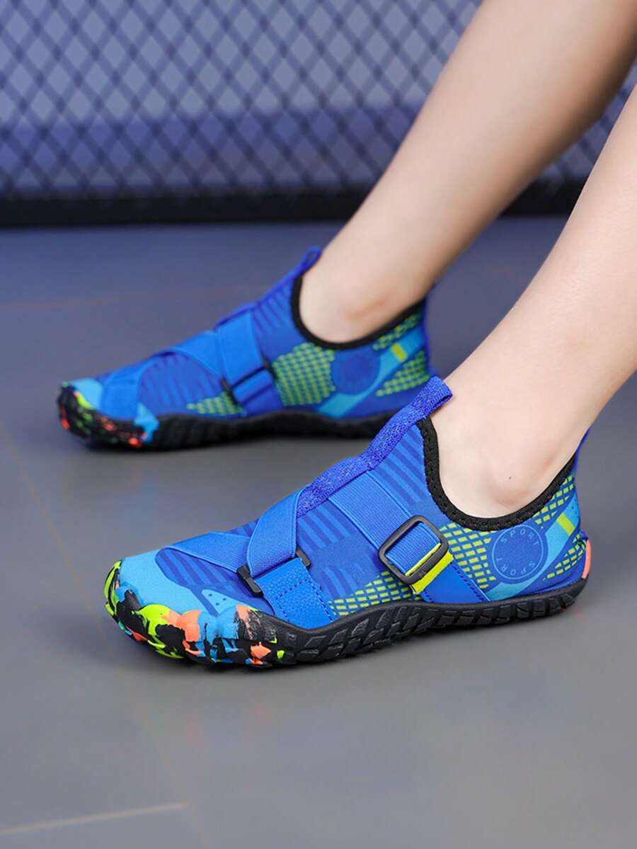 Kids lightweight breathable slip-on water shoes in black plaid pattern with rubber outsole for boys and girls.