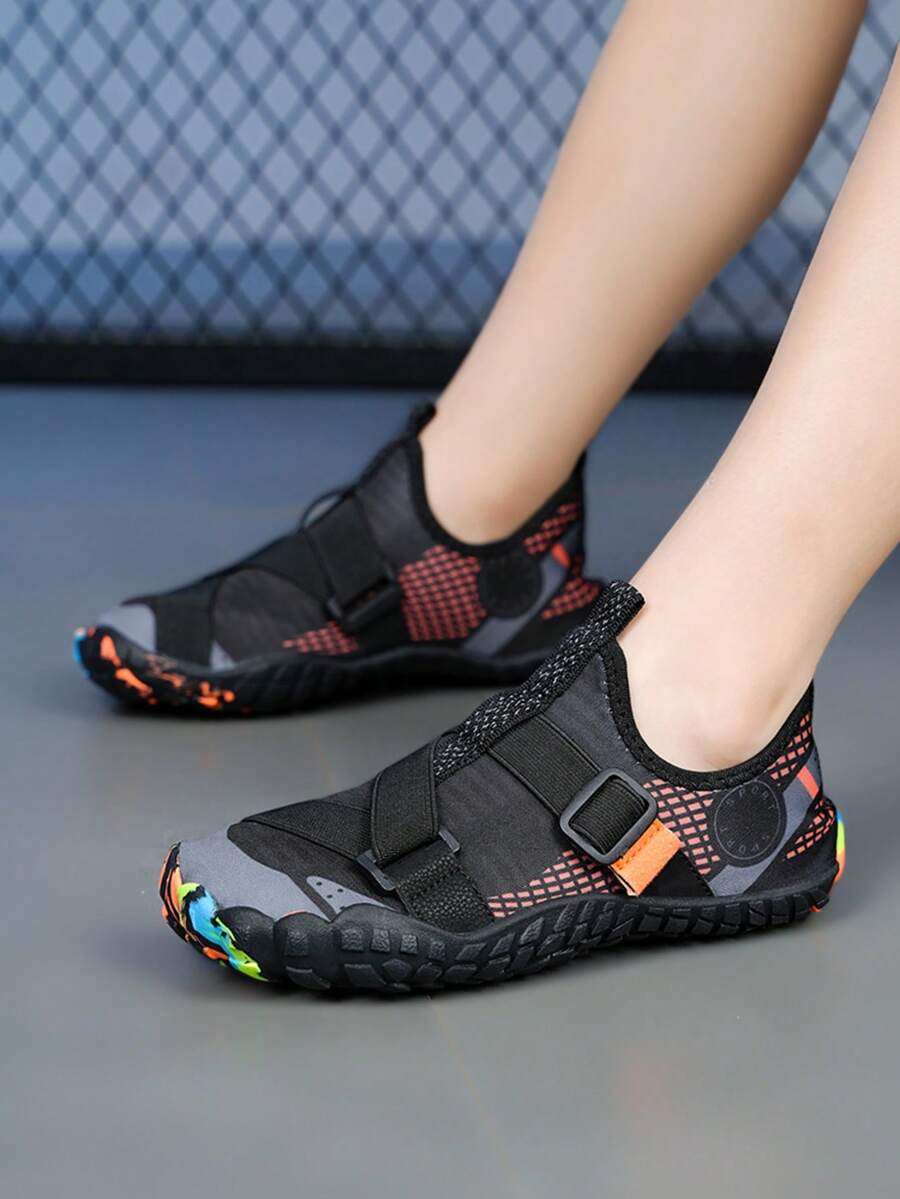 Kids lightweight breathable slip-on water shoes in black plaid pattern with rubber outsole for boys and girls.