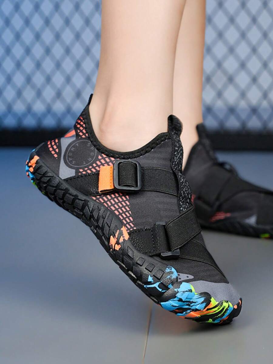 Kids lightweight breathable slip-on water shoes in black plaid pattern with rubber outsole for boys and girls.